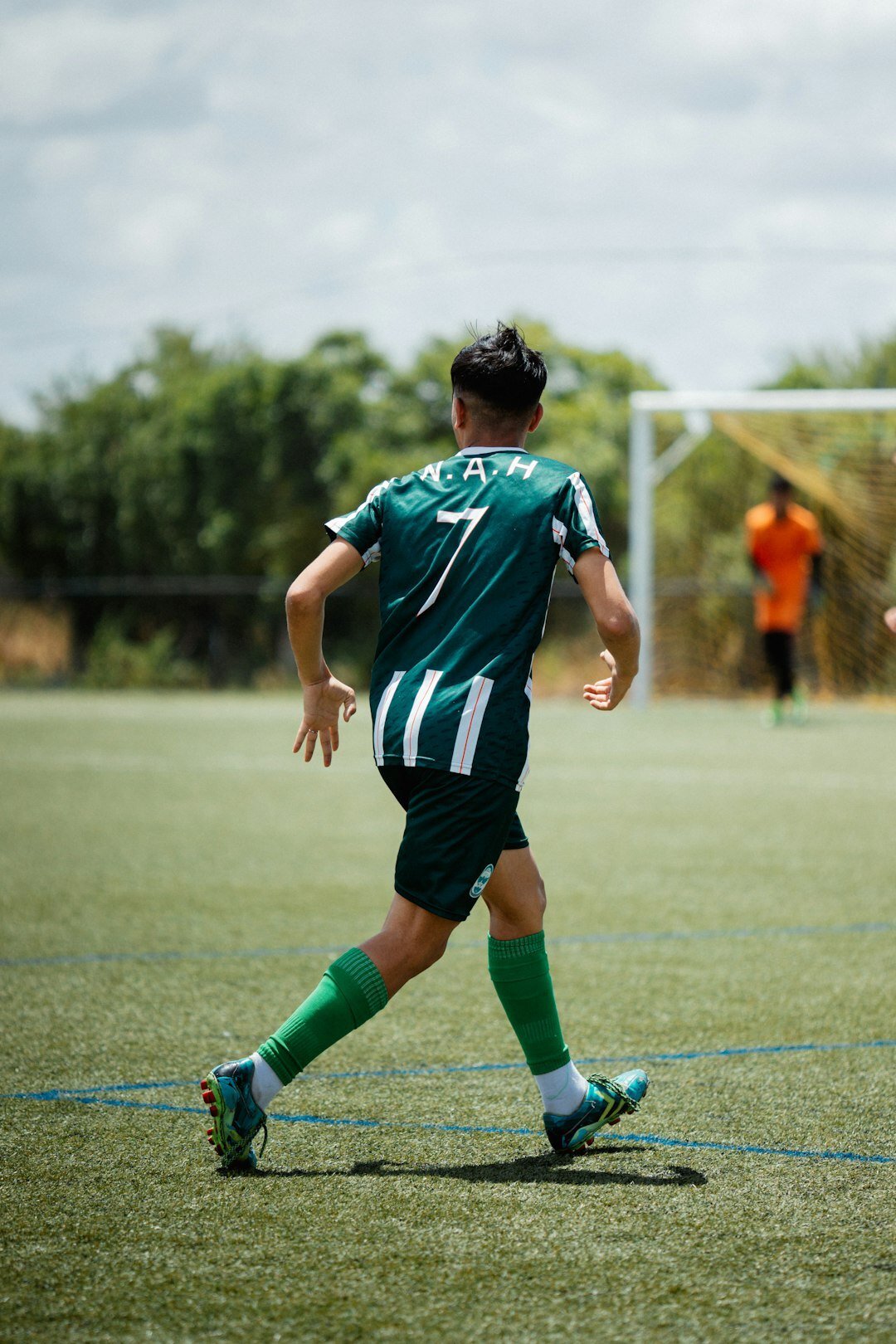 Uruguayan football player celebrating a goal on the field