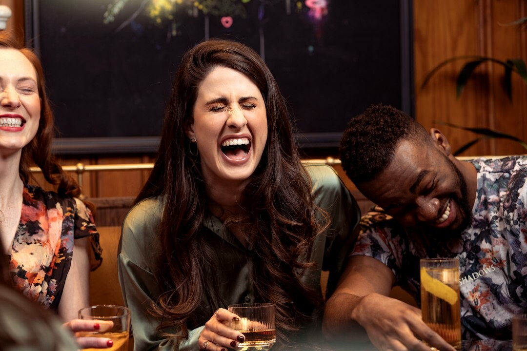 group of celebrities laughing